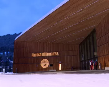 Davos Conference Center Displays Activist's Call to Abolish Billionaires 