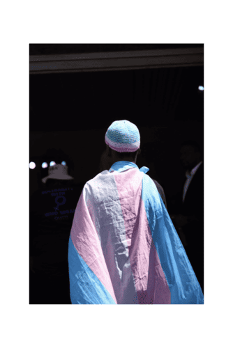 A man walking into a dark room